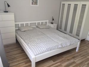 Posteľ alebo postele v izbe v ubytovaní Apartament Warszawska