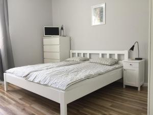 Posteľ alebo postele v izbe v ubytovaní Apartament Warszawska