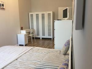 Posteľ alebo postele v izbe v ubytovaní Apartament Warszawska