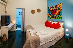 Cama ou camas em um quarto em Pousada e Restaurante Fim da Trilha