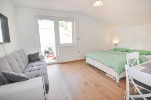 Posteľ alebo postele v izbe v ubytovaní Apartment Helen