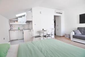 Kuchyňa alebo kuchynka v ubytovaní Apartment Helen