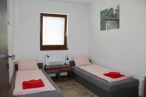 Una cama o camas en una habitación de Apartmany Podhorama