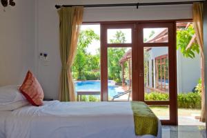 Bazén v ubytování Ardea Resort Pool Villa nebo v jeho okolí