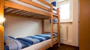 Postel nebo postele na pokoji v ubytování Haus Aristella