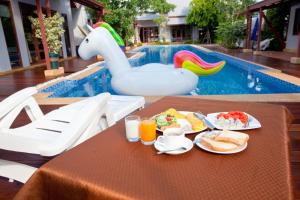 Bazén v ubytování Ardea Resort Pool Villa nebo v jeho okolí