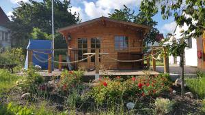 Zahrada ubytování Ferienwohnungen am kleinen See