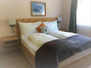 Letto o letti in una camera di Hotel Pizzeria Selva