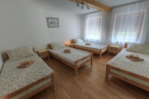 Postel nebo postele na pokoji v ubytování Fortuna Apartments