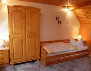 Postel nebo postele na pokoji v ubytování Pension a la Kleinert