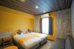 Postel nebo postele na pokoji v ubytování La'gent Hotel Tokyo Bay