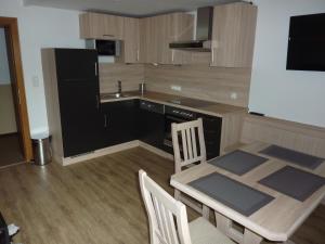 Kuchyň nebo kuchyňský kout v ubytování Apartment Christoph