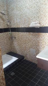 Koupelna v ubytování Fini Hotel Bobende