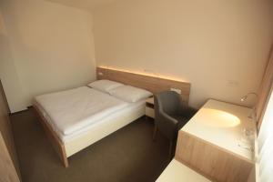 Cama o camas de una habitación en Hotel Devítka