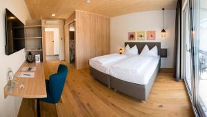 Postel nebo postele na pokoji v ubytování Hotel Katamaran