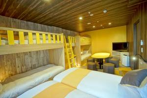 Postel nebo postele na pokoji v ubytování La'gent Hotel Tokyo Bay