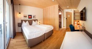 Postel nebo postele na pokoji v ubytování Hotel Katamaran