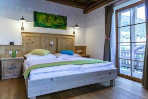 Postel nebo postele na pokoji v ubytování Residence Mitterdorfer