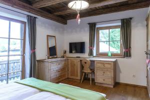 TV a/nebo společenská místnost v ubytování Residence Mitterdorfer