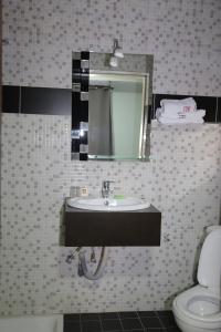 Koupelna v ubytování Fini Hotel Bobende