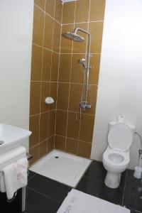 Koupelna v ubytování Fini Hotel Bobende