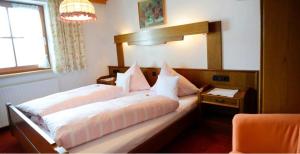 Letto o letti in una camera di Gastehaus Wolf