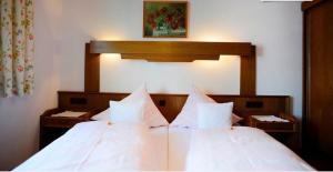 Letto o letti in una camera di Gastehaus Wolf
