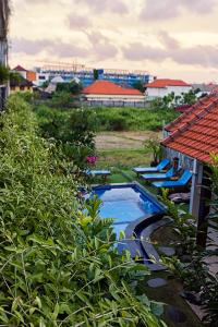 Bazén v ubytování Bali Full Moon Guest House nebo v jeho okolí