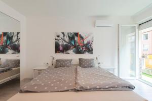 Posteľ alebo postele v izbe v ubytovaní Casa Tua3