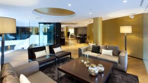 A seating area at Hotel Condes de Barcelona