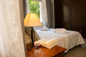 Ένα ή περισσότερα κρεβάτια σε δωμάτιο στο Alexandra Apartment Near Chania Center