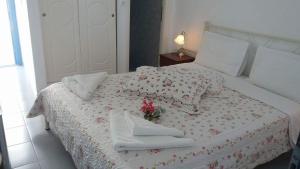 Ліжко або ліжка в номері Artemis Rooms