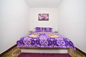 Postel nebo postele na pokoji v ubytování MG apartments and rooms