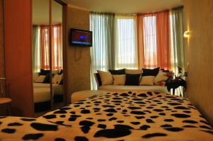 Postel nebo postele na pokoji v ubytování Hotel Om Shanti