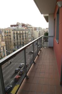 a balcony of a building with a view of a highway at Apartaments Aragó565 in Barcelona