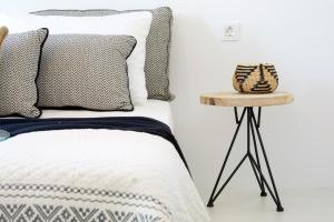 Postel nebo postele na pokoji v ubytování Le Blanc Suite