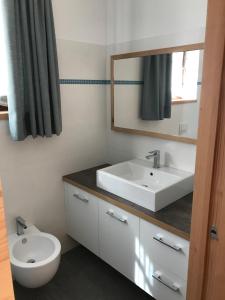 Koupelna v ubytování Casa Miramonti