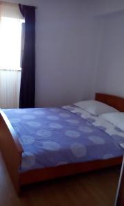 Cama o camas de una habitación en Apartment Skradin
