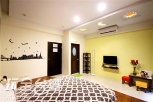 Televisyen dan/atau pusat hiburan di Outingfun Bed and Breakfast