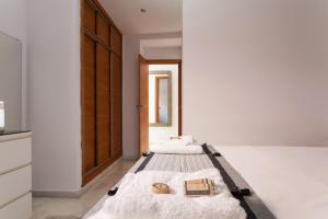 Postel nebo postele na pokoji v ubytování Luxury Rooftop - Space Maison Apartments