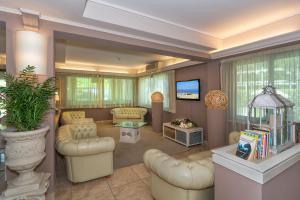 TV a/nebo společenská místnost v ubytování Hotel Siesta