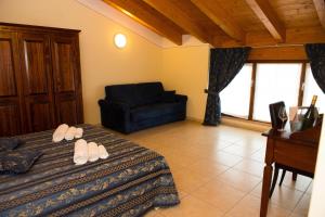 Postel nebo postele na pokoji v ubytování B&B Le Murette - ENJOY HOLIDAY