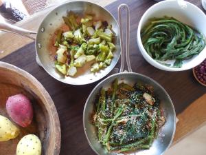a table with three bowls of food and vegetables at place in paradise in Castelbuono +15 photos