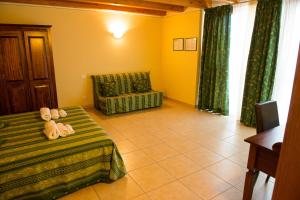Postel nebo postele na pokoji v ubytování B&B Le Murette - ENJOY HOLIDAY