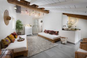 a living room with a couch and a table at Casa Pharus in Bale