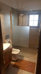 Koupelna v ubytování Hotel Bujtina Ollga
