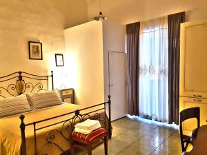 Postel nebo postele na pokoji v ubytování Residenza Celeste