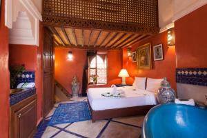Postel nebo postele na pokoji v ubytování Riad Zanzibar