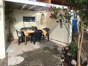 a table and chairs sitting on a patio at Sebastiana's Monteur FeWo in Merzig