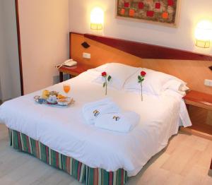 Posteľ alebo postele v izbe v ubytovaní Hotel Del Val